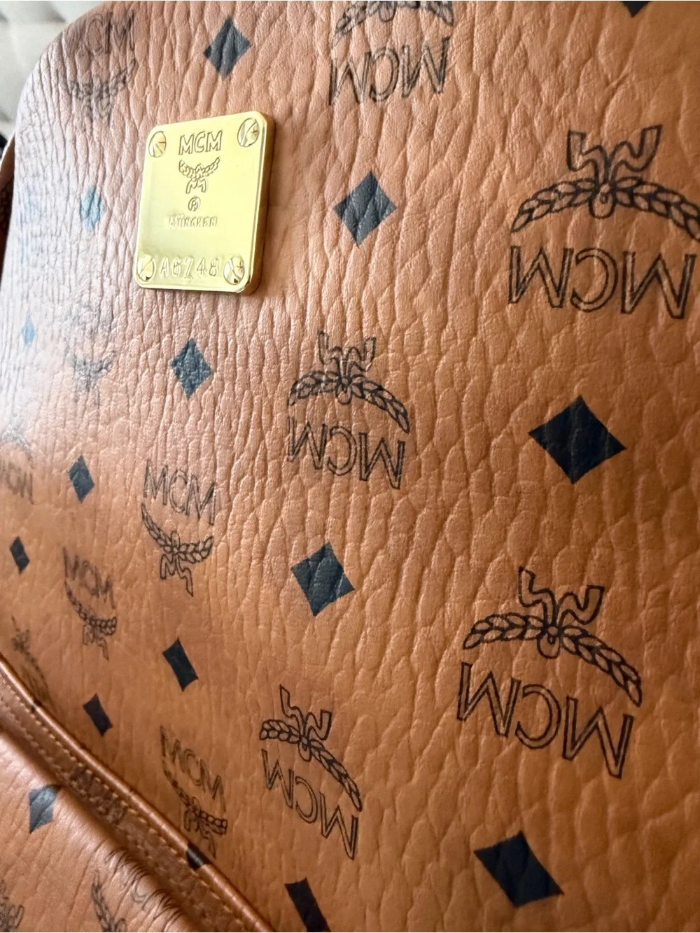 MCM Cognac Visetos Monogram Backpack with Gold Hardware